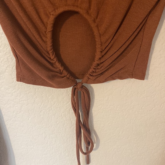 This is a mock neck type long sleeve cropped top. - Picture 2 of 4